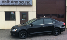 2011 Volkswagen Jetta with professional window tint in North Bay